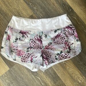 Athleta Run With It shorts in white with watercolor floral print